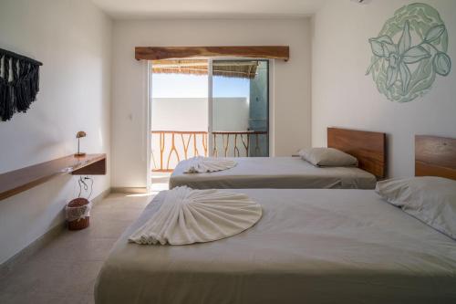 Imagen de la habitación del Hotel Caliza Tulum. Foto 11