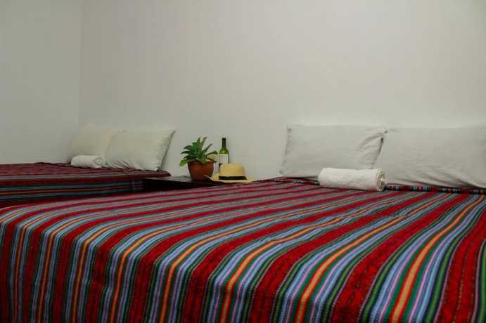Imagen de la habitación del Hotel Calle Real. Foto 8