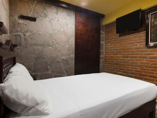 Imagen de la habitación del Hotel Calli Yolotl. Foto 7
