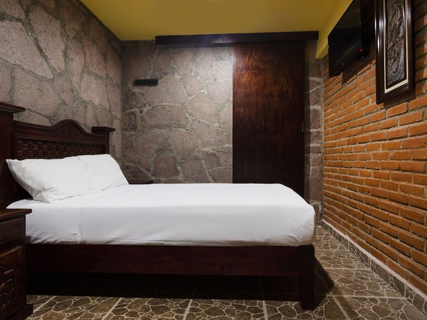 Imagen de la habitación del Hotel Calli Yolotl. Foto 11