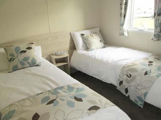 Imagen de la habitación del Hotel Calloose Holiday Park. Foto 14