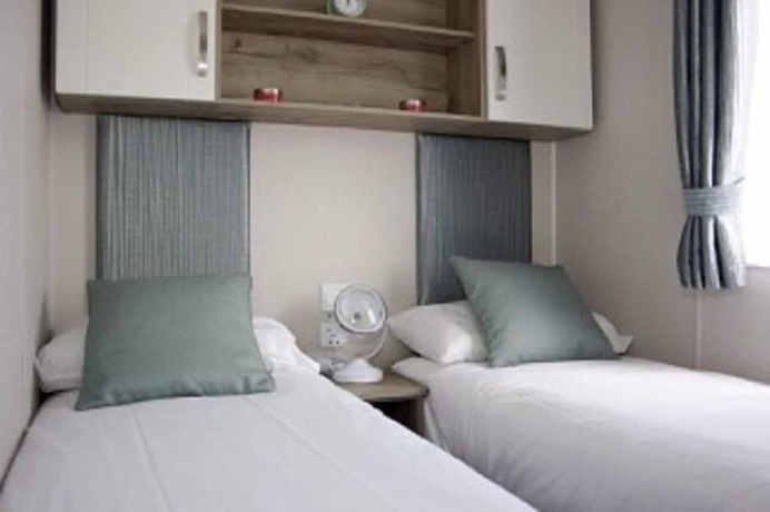 Imagen de la habitación del Hotel Calloose Holiday Park. Foto 19