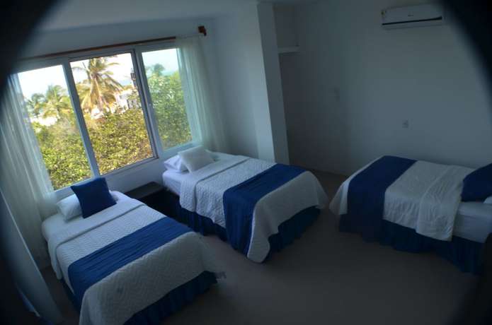 Imagen de la habitación del Hotel Cally Galapagos. Foto 4