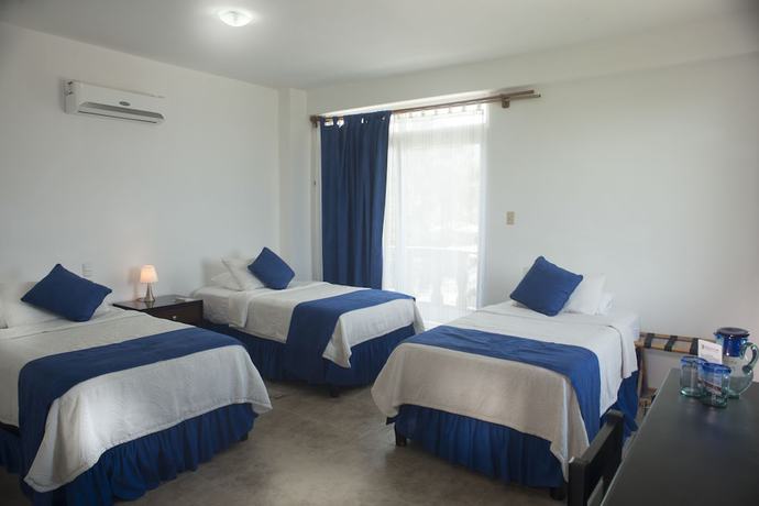 Imagen de la habitación del Hotel Cally Galapagos. Foto 7