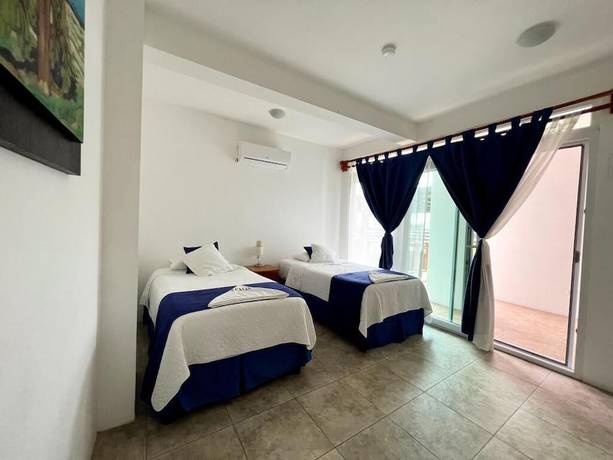 Imagen de la habitación del Hotel Cally Galapagos. Foto 10