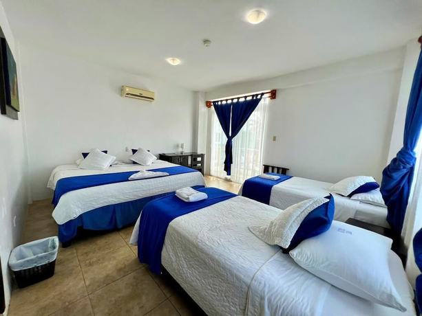 Imagen de la habitación del Hotel Cally Galapagos. Foto 13