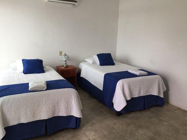 Imagen de la habitación del Hotel Cally Galapagos. Foto 14