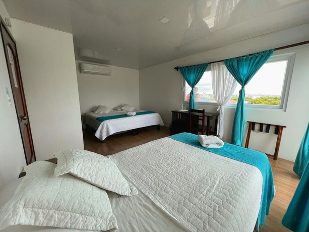 Imagen de la habitación del Hotel Cally Galapagos. Foto 17