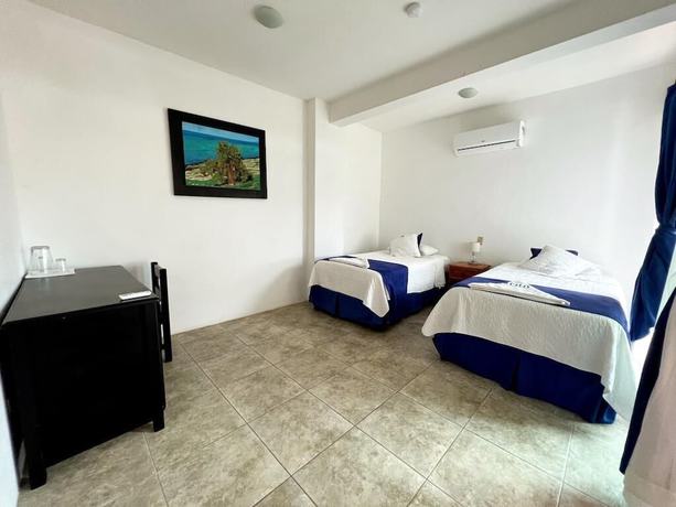 Imagen de la habitación del Hotel Cally Galapagos. Foto 18