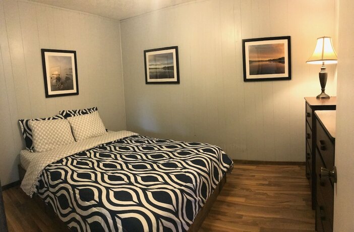Imagen de la habitación del Hotel Calm Waters Cabin Resort. Foto 13