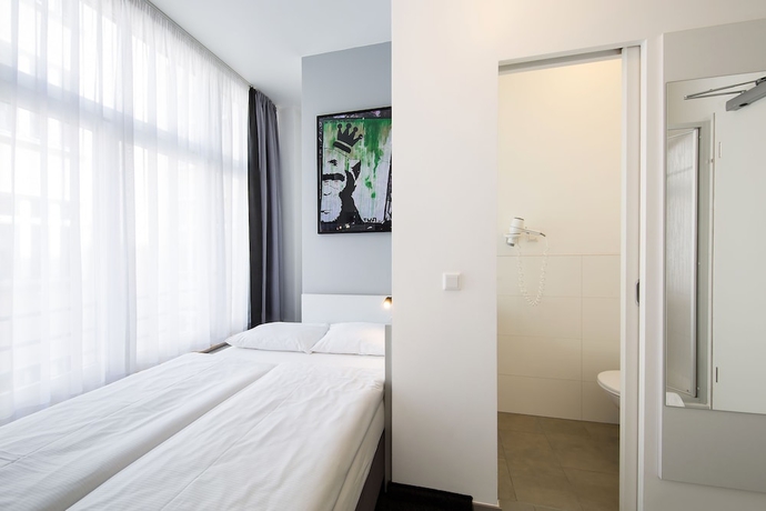 Imagen de la habitación del Hotel Calma Berlin Mitte. Foto 13