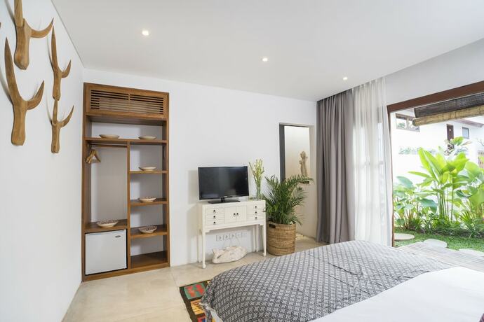Imagen de la habitación del Hotel Calma Ubud. Foto 16