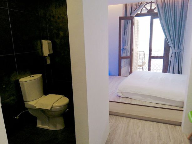 Imagen de la habitación del Hotel Calmo Chinatown. Foto 7