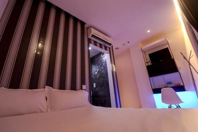 Imagen de la habitación del Hotel Calmo Chinatown. Foto 16