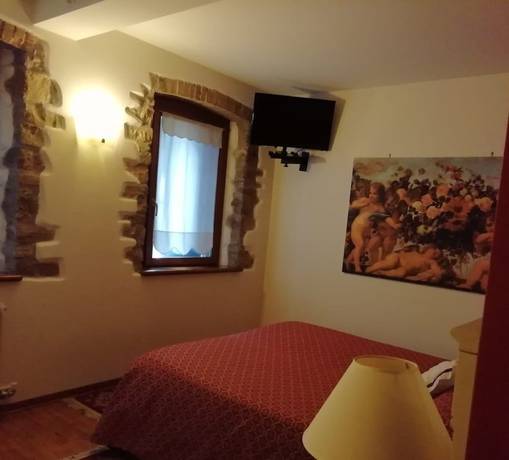 Imagen de la habitación del Hotel Calvi, Vittorio Veneto. Foto 4