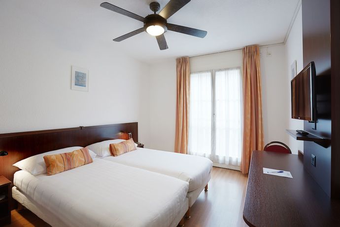 Imagen de la habitación del Hotel Calvy, Ginebra. Foto 13