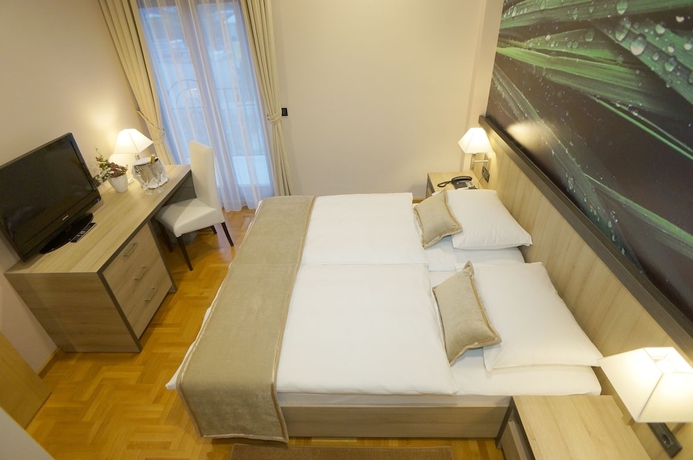 Imagen de la habitación del Hotel Calypso, Zagreb. Foto 12
