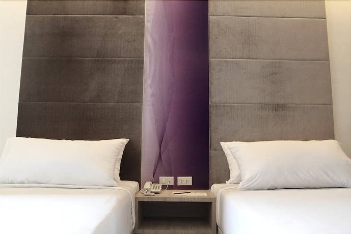 Imagen de la habitación del Hotel Calypzo 2. Foto 4