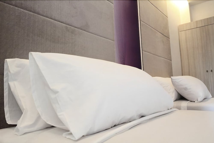 Imagen de la habitación del Hotel Calypzo 2. Foto 5