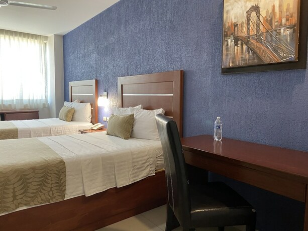 Imagen de la habitación del Hotel Calzada Inn. Foto 23