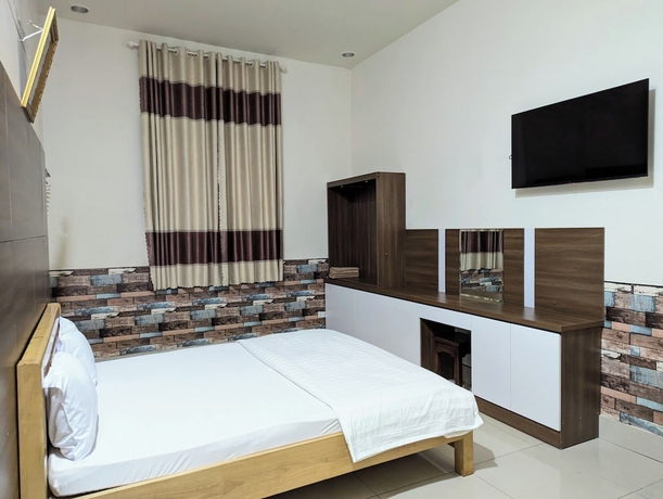 Imagen de la habitación del Hotel Cam Uyen. Foto 6