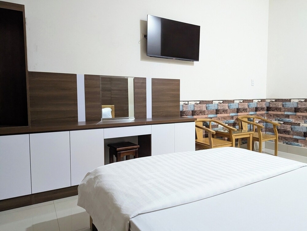 Imagen de la habitación del Hotel Cam Uyen. Foto 7