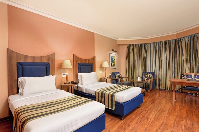Imagen de la habitación del Hotel Cama, Ahmedabad. Foto 4