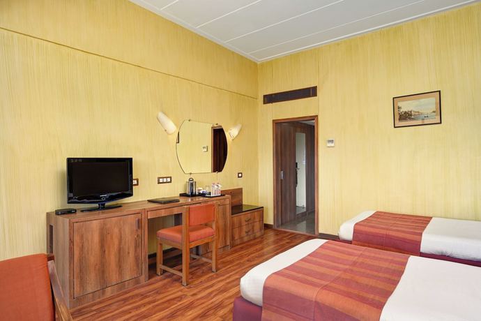 Imagen de la habitación del Hotel Cama, Ahmedabad. Foto 10