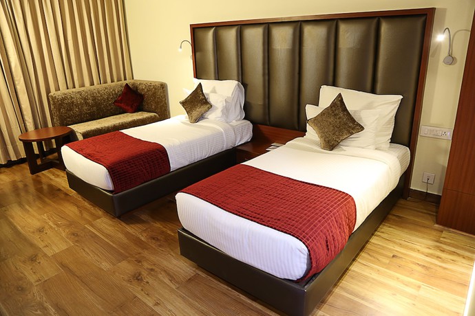 Imagen de la habitación del Hotel Cama, Mohali. Foto 17