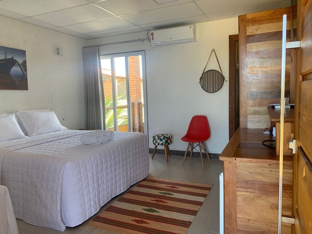 Imagen de la habitación del Hotel Camaleao Ecopousada Ltda. Foto 9