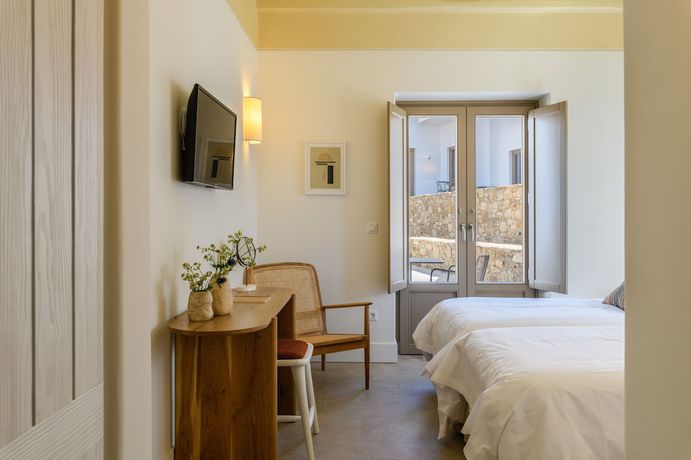 Imagen de la habitación del Hotel Camarades Mykonos. Foto 1