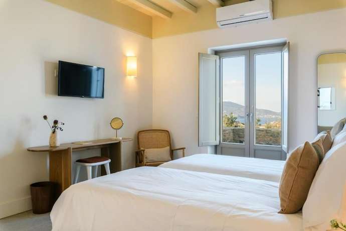 Imagen de la habitación del Hotel Camarades Mykonos. Foto 2