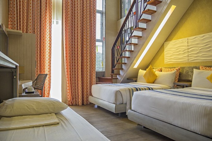 Imagen de la habitación del Hotel Camaya Coast. Foto 3