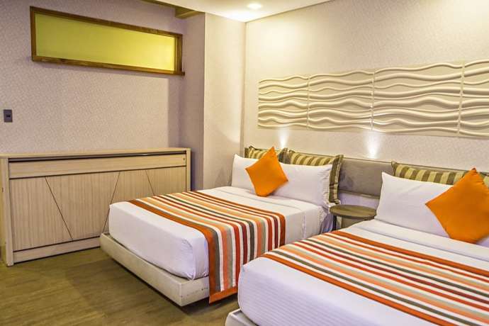 Imagen de la habitación del Hotel Camaya Coast. Foto 6