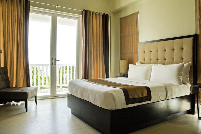 Imagen de la habitación del Hotel Camaya Coast. Foto 9