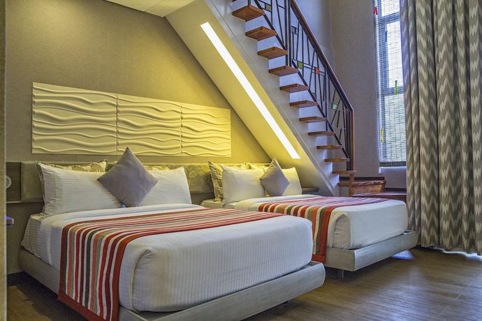 Imagen de la habitación del Hotel Camaya Coast. Foto 12