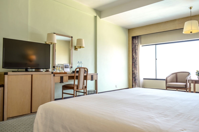 Imagen de la habitación del Hotel Cambodiana. Foto 6