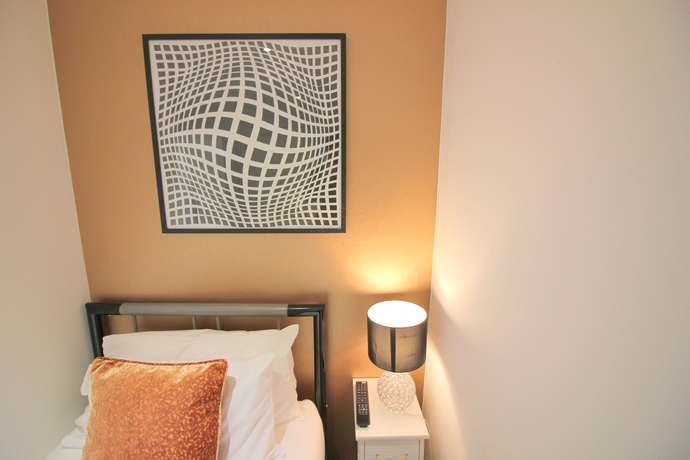 Imagen de la habitación del Hotel Cambridge City Rooms By Paymán Club. Foto 5