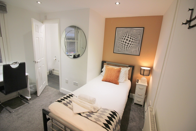 Imagen de la habitación del Hotel Cambridge City Rooms By Paymán Club. Foto 6