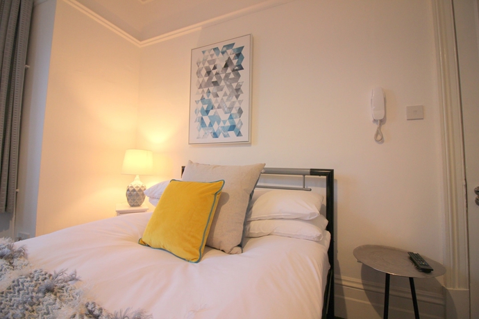 Imagen de la habitación del Hotel Cambridge City Rooms By Paymán Club. Foto 8