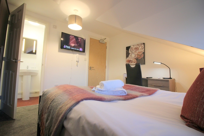 Imagen de la habitación del Hotel Cambridge City Rooms By Paymán Club. Foto 9