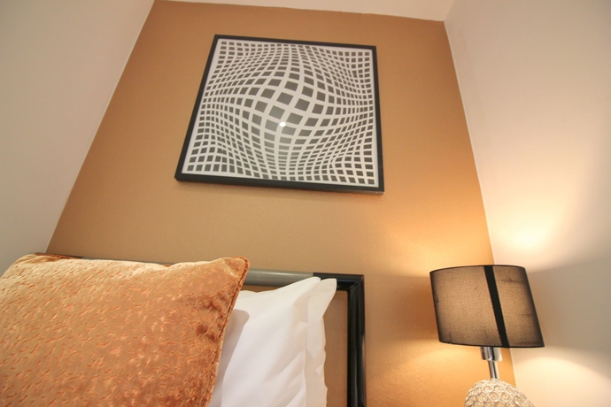 Imagen de la habitación del Hotel Cambridge City Rooms By Paymán Club. Foto 15