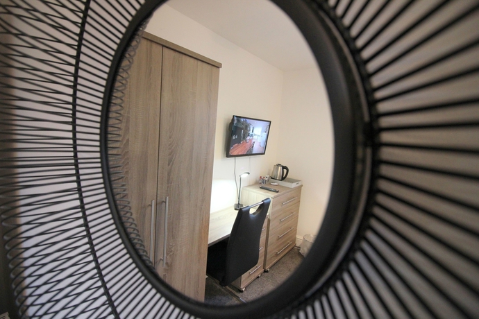 Imagen de la habitación del Hotel Cambridge City Rooms By Paymán Club. Foto 17