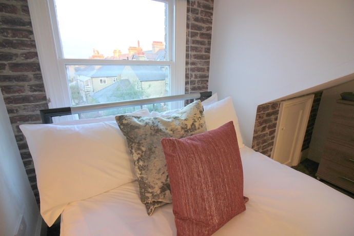 Imagen de la habitación del Hotel Cambridge City Rooms By Paymán Club. Foto 18