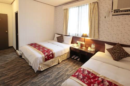 Imagen de la habitación del Hotel Cambridge Confucius Inn. Foto 1