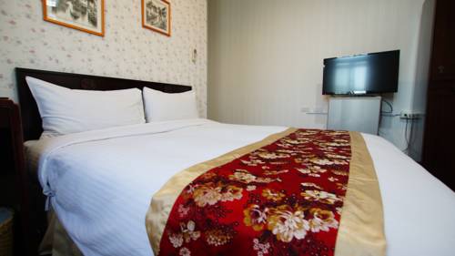 Imagen de la habitación del Hotel Cambridge Confucius Inn. Foto 4