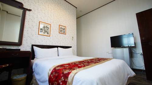 Imagen de la habitación del Hotel Cambridge Confucius Inn. Foto 5