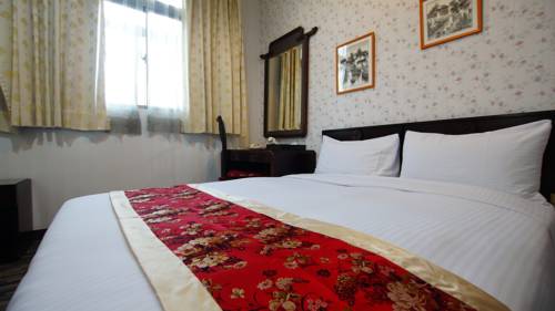 Imagen de la habitación del Hotel Cambridge Confucius Inn. Foto 6
