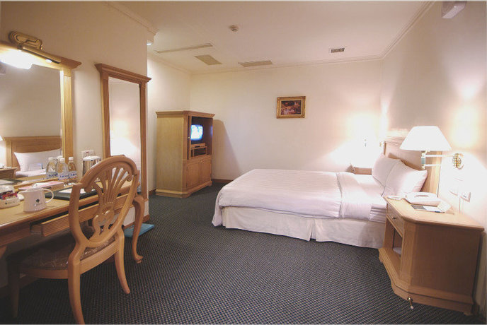 Imagen de la habitación del Hotel Cambridge Hotel Yung Kong. Foto 8