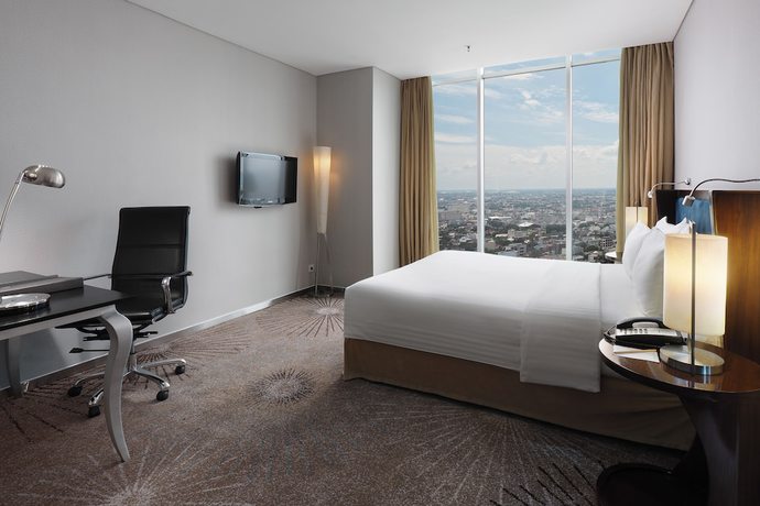 Imagen de la habitación del Hotel Cambridge Medan. Foto 6